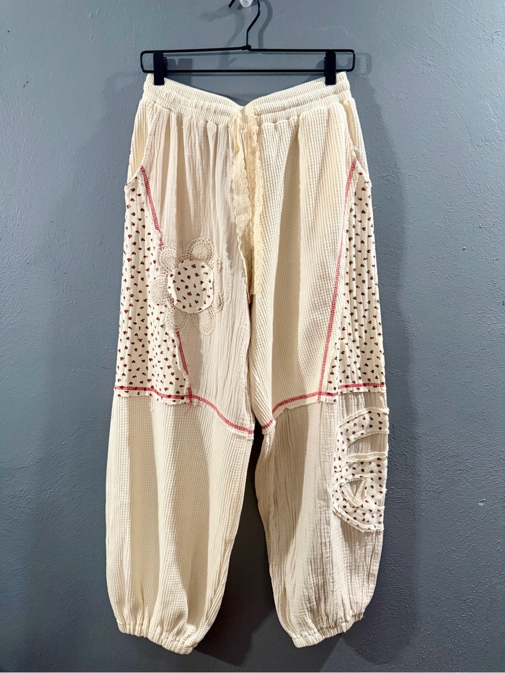 NWOT. POL Cream Patchwork Joggers with Red Trim